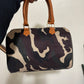 Camo Handbag Buy-In